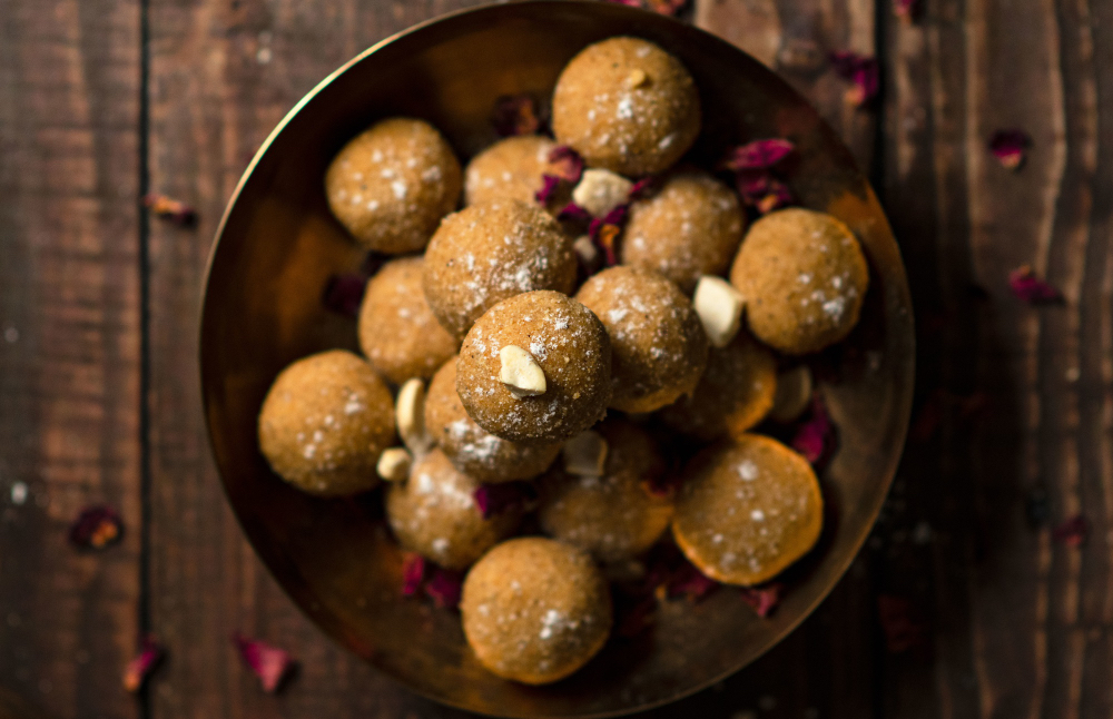 Where do I get customized mithai or laddoos for naming ceremonies?